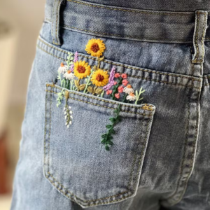 Floral embroidered jean shorts